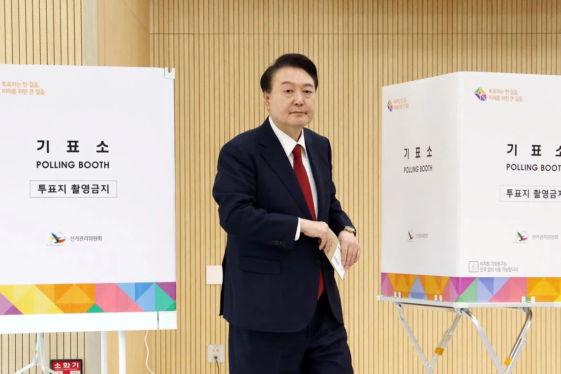 South Korean President Yoon Suk Yeol casts his early vote for 22nd parliamentary election, in Busan, South Korea, April 5, 2024.   Yonhap via REUTERS/ File Photo