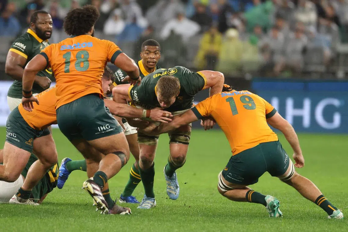 South Africa's Pieter-Steph du Toit is tackled in the Rugby Championship against Australia at Optus Stadium in Perth on Aug 17, 2024. He is moving from flanker to lock against New Zealand on Sept 1.