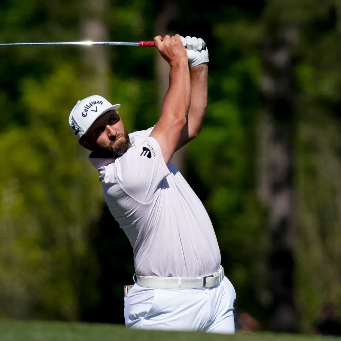 Apr 9, 2026; Augusta, Georgia, USA; Jon Rahm tees off on the 12th hole during the first round of the Masters Tournament at Augusta National Golf Club. Mandatory Credit: Grace Smith-Imagn Images
