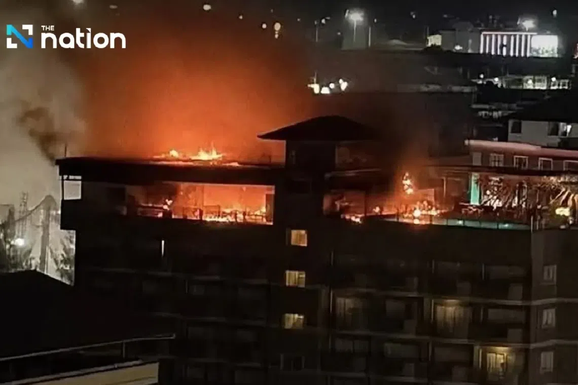 Sparks from a short circuit on the hotel's roof reportedly reached palm-thatch decorations, causing the flames to spread quickly.