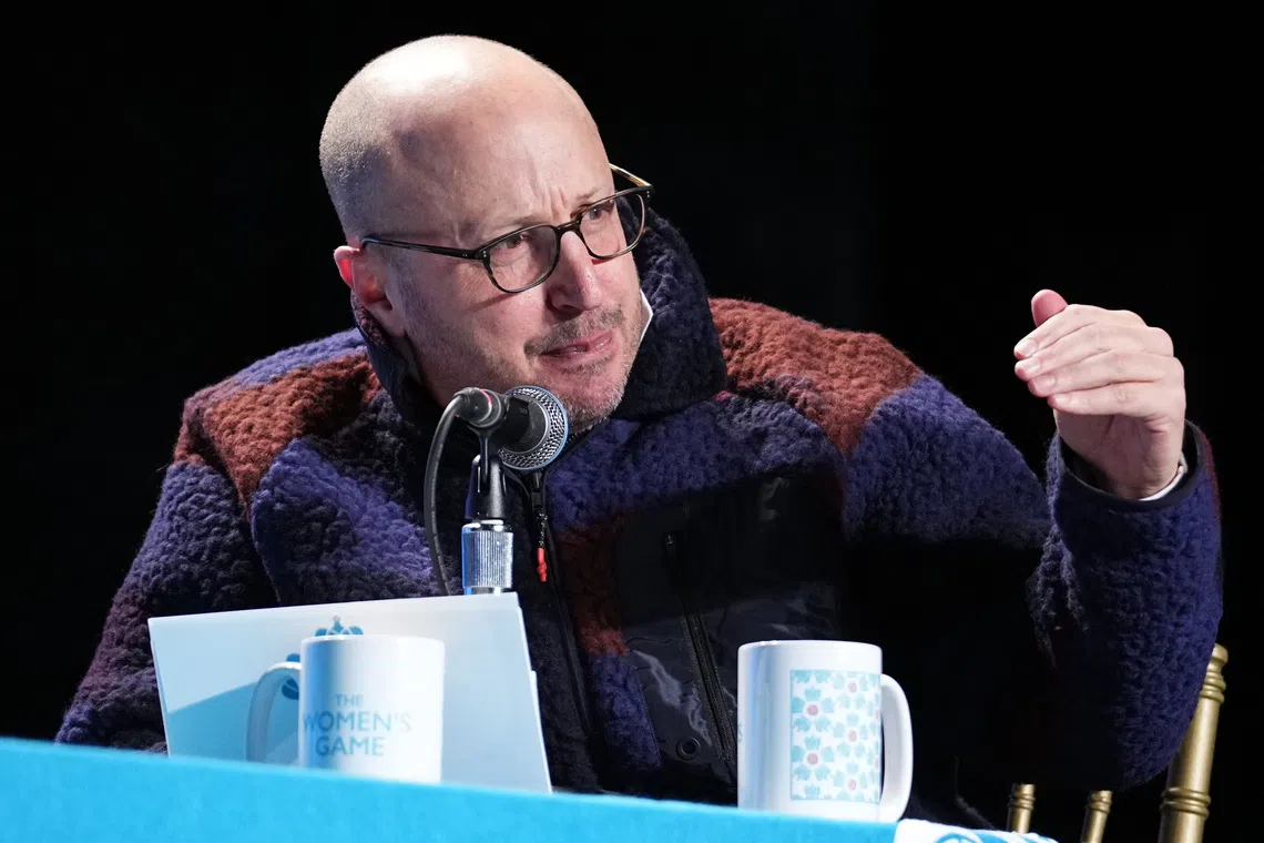 Nov 21, 2024; Kansas City, Missouri, USA; Men in Blazers podcast host Roger Bennett on stage during The Night of 1000 Stars ahead of the 2024 NWSL Championship match at The Madrid Theatre. Mandatory Credit: Denny Medley-Imagn Images