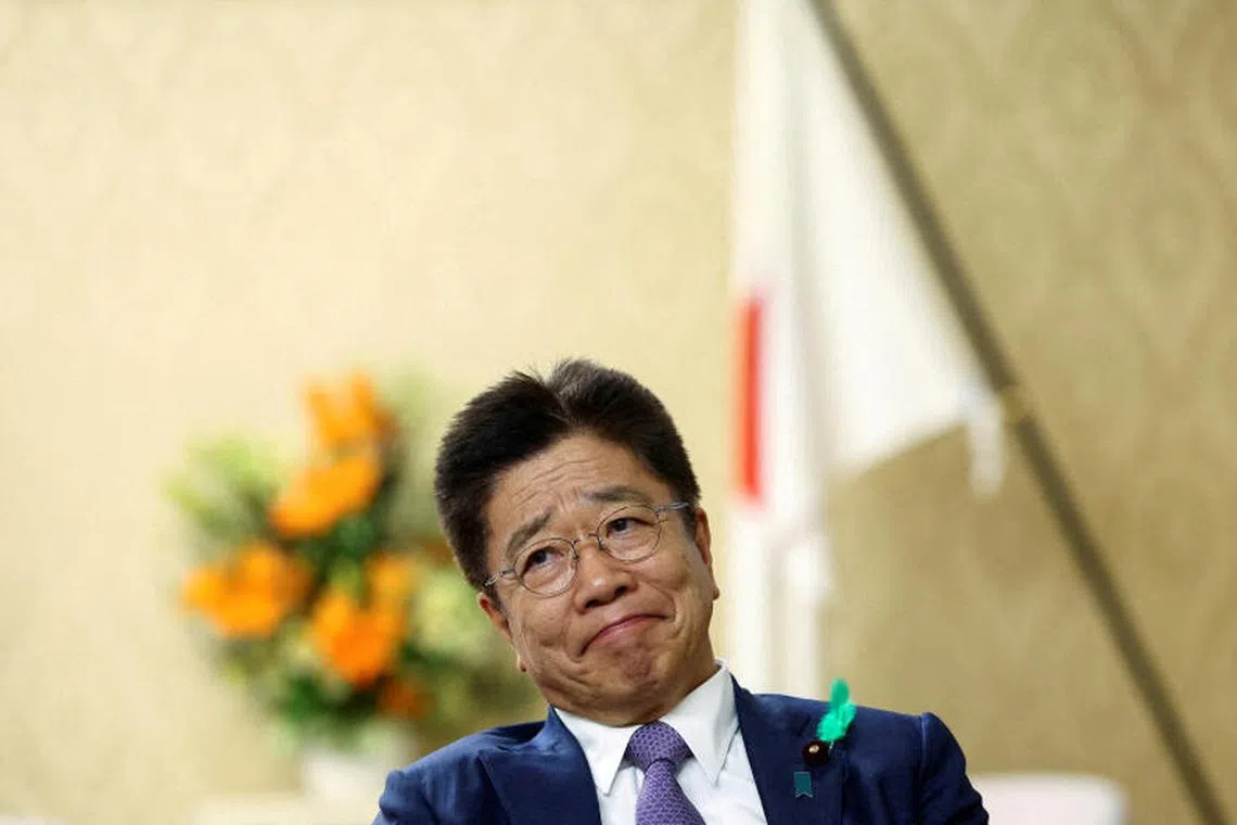 FILE PHOTO: FILE PHOTO: Japan's Finance Minister Katsunobu Kato listens to a question during an interview with Reuters at the Finance Ministry in Tokyo, Japan April 17, 2025. REUTERS/Issei Kato/File Photo/File Photo/File Photo