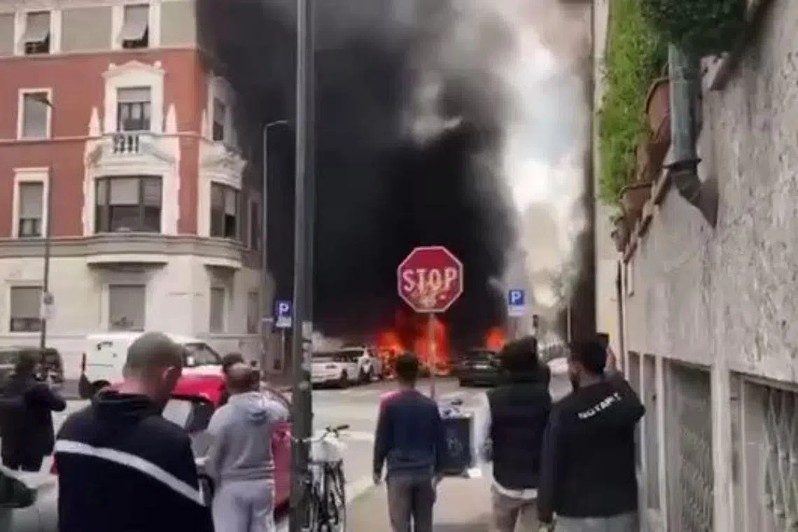 A video from social media showed several cars in flames, with plumes of black smoke rising from the wreckage.