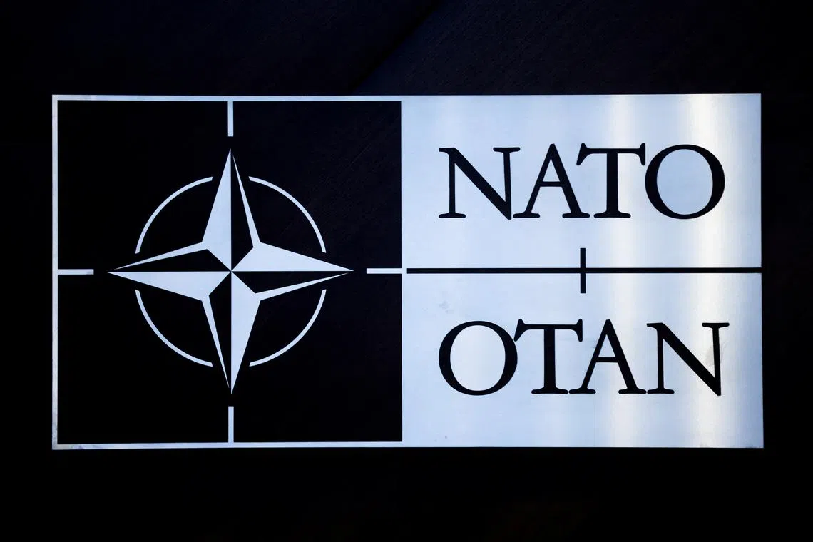 FILE PHOTO: The logo of NATO is seen at a meeting of the North Atlantic Council in the NATO defence ministers' session together with Sweden as the invitee, at the Alliance's headquarters in Brussels, Belgium February 15, 2024. REUTERS/Johanna Geron/File Photo