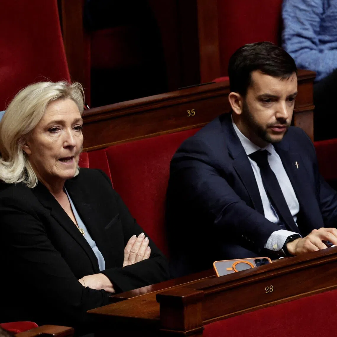 RN president Marine Le Pen (left) and RN  MP Jean-Philippe Tanguy, who says he has been working on a Bill that would allow brothels to re-open in France.