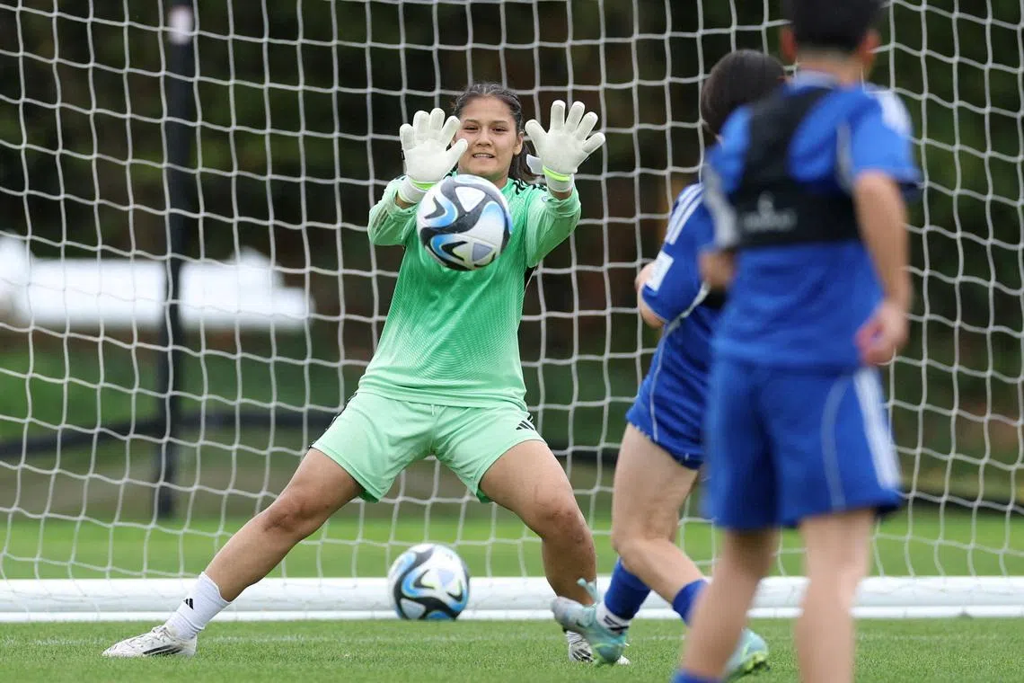 FILE PHOTO: Soccer Football - Elaha Safdari of the Afghan Women's Refugee team makes a save during a selection camp at St. George's Park, Burton upon Trent, Britain - August 26, 2025 REUTERS/John Sibley/File Photo