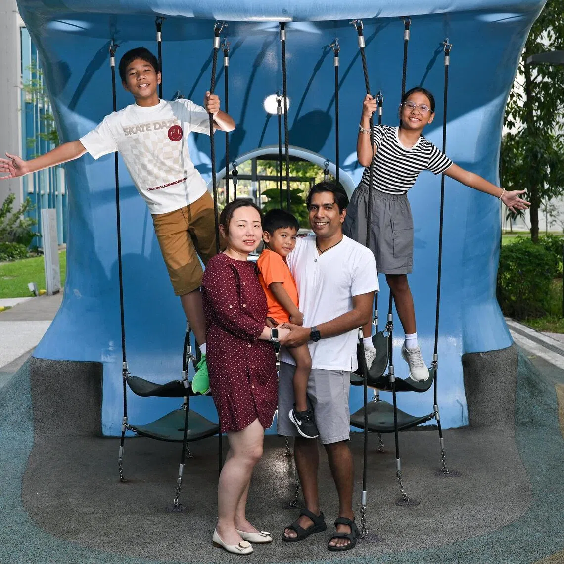 Thinesh Edward Balasingam (front row, right) with his wife, Xiao Hui (front row, left) and children, Krish, 13 (back row, left), Adwita, 11 (back row, right) and Skanda, four. 