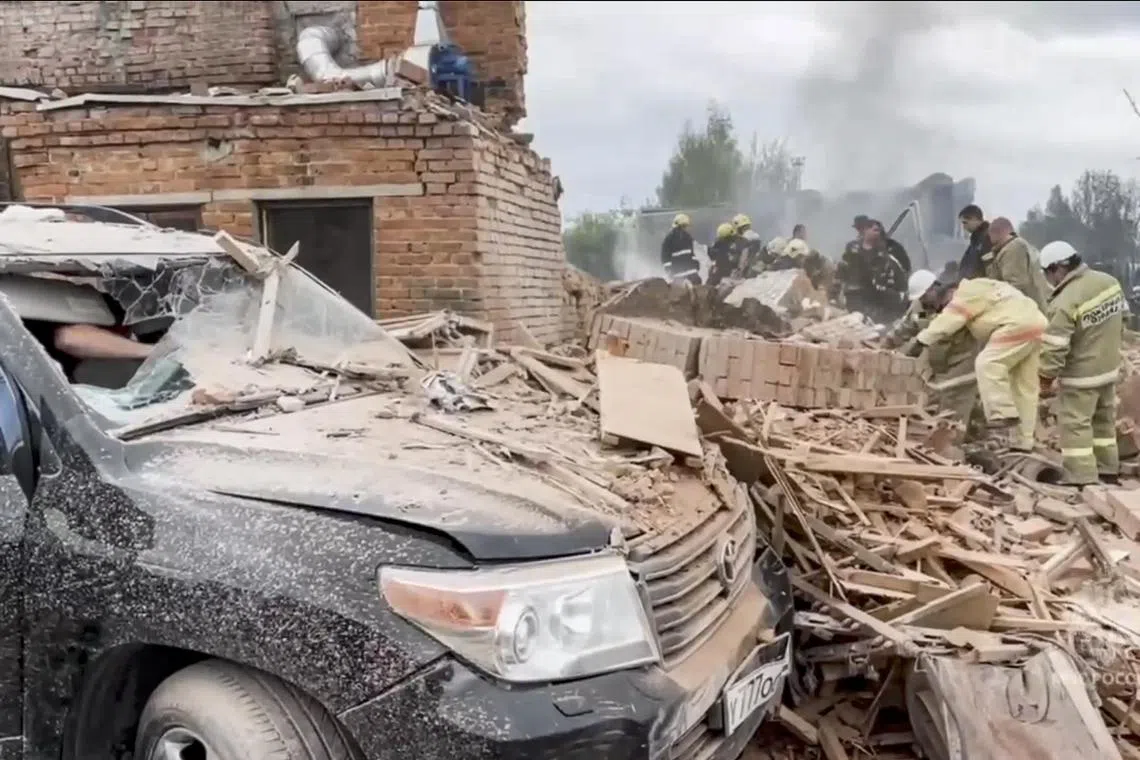 A screengrab from video shows emergency personnel working at the site of the blast.