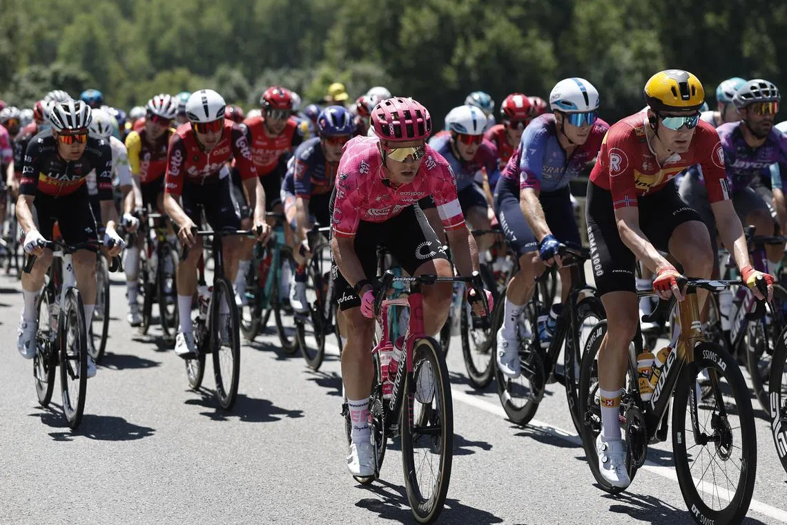 Cycling - Tour de France - Stage 11 - Toulouse to Toulouse - Toulouse, France - July 16, 2025 EF Education - EasyPost's Michael Valgren in action with riders during stage 11 REUTERS/Benoit Tessier