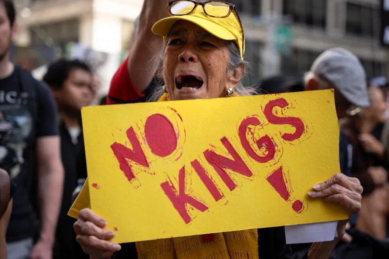 People participate in the 'No Kings' protest in New York, USA, on Oct 18.