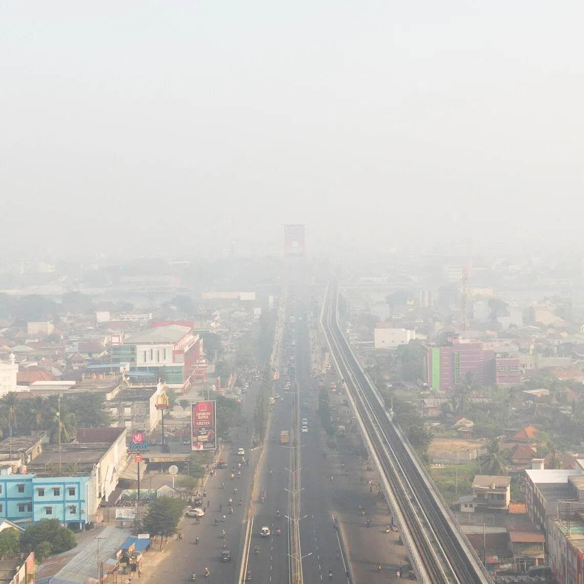 The Ampera Bridge shrouded in haze from wildfires in Palembang, in Indonesia’s South Sumatra province, on Aug 23.