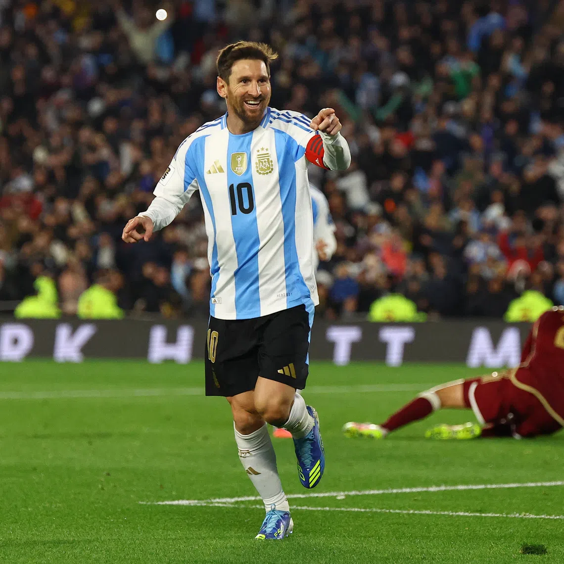 Soccer Football - World Cup - CONMEBOL Qualifiers - Argentina v Venezuela - Estadio Monumental, Buenos Aires, Argentina - September 4, 2025 Argentina's Lionel Messi celebrates scoring their third goal REUTERS/Agustin Marcarian