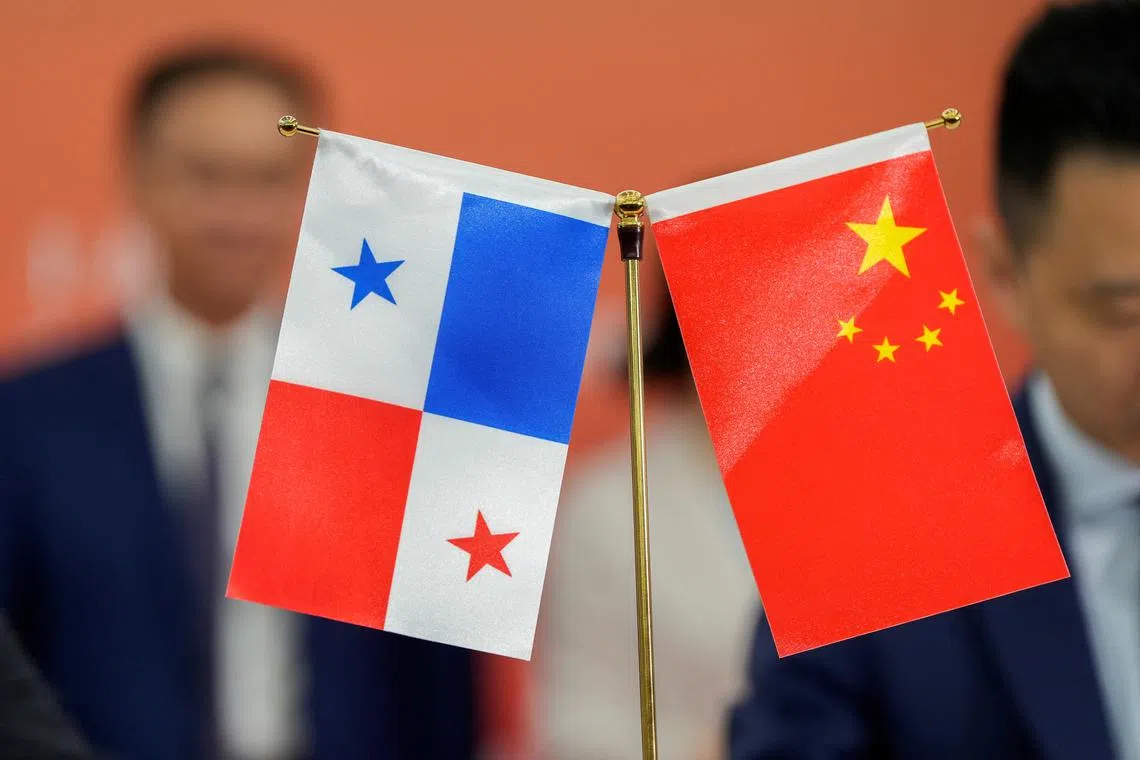 FILE PHOTO: The flags of Panama and China are seen during a meeting held with Chinese and Panamanian companies to sign several trade agreements, in Panama City, Panama August 26, 2024. REUTERS/Enea Lebrun/File Photo