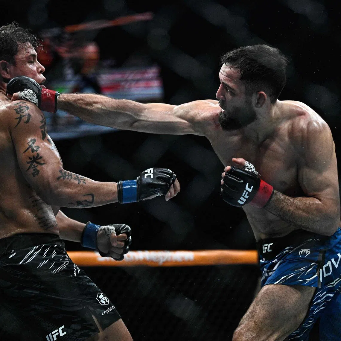 France's Nassourdine Imavov (right) punching Brazil's Caio Borralho during the the main event of UFC Fight Night at the Bercy Accor Arena in Paris on Sept 6 as he earned a unanimous decision – 50-45, 49-46, 49-46.