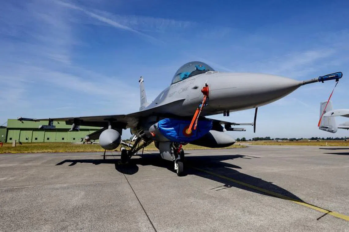 An F-16 combat jet of the US Airforce is prepared for practice flights ahead of the Air Defender Exercise 2023 at the military airport of Jagel, northern Germany, on June 9, 2023.   AXEL HEIMKEN/Pool via REUTERS/ File Photo