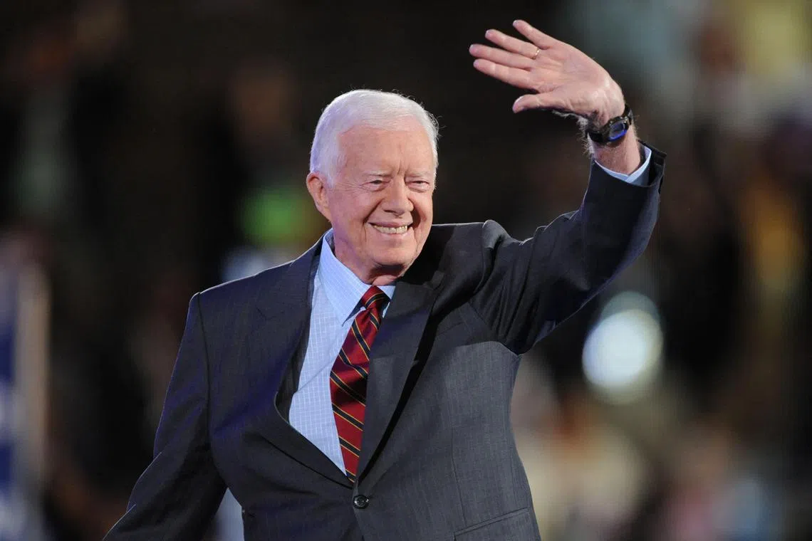 World leaders hail former US president Jimmy Carter for  the Camp David Accords and his work for Habitat for Humanity.