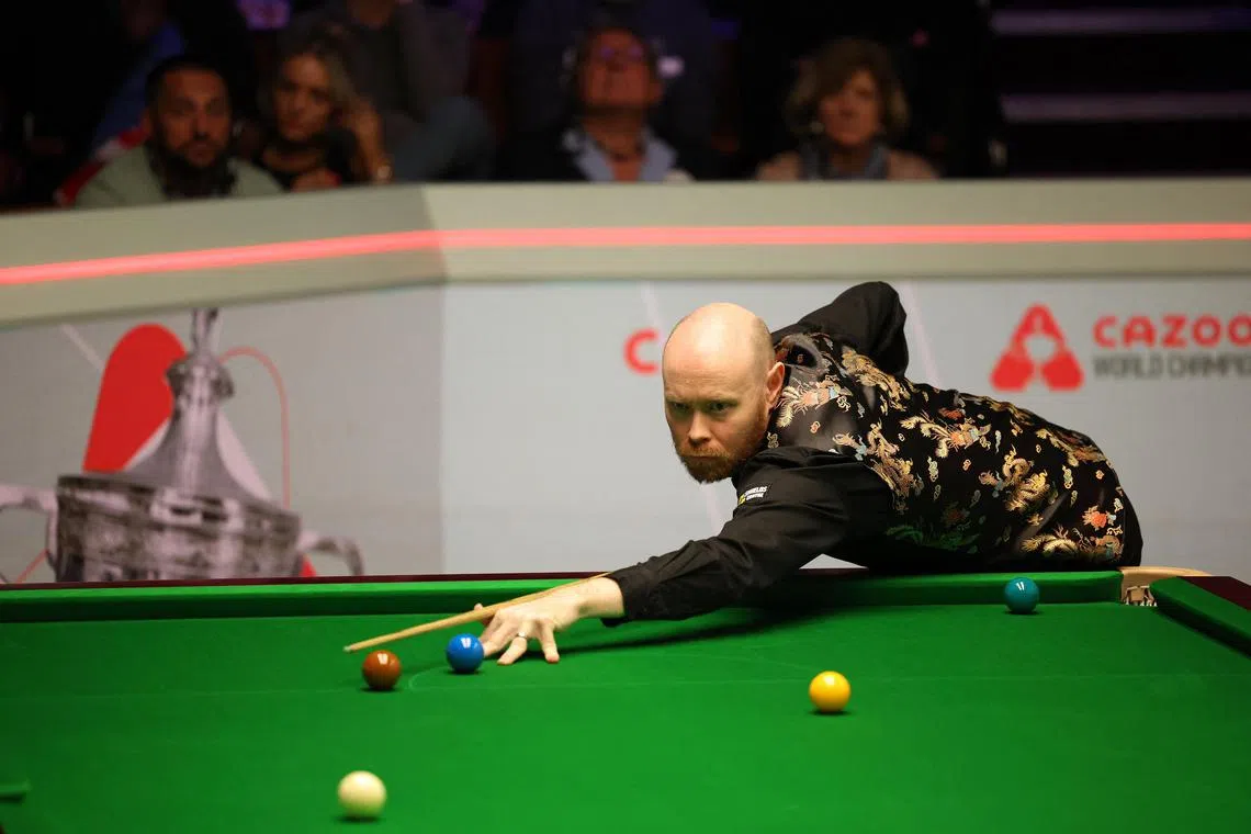 England's Gary Wilson in action during his first round game at the World Snooker Championship.
