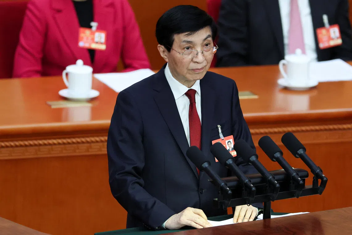 Chinese People's Political Consultative Conference (CPPCC) Chairman Wang Huning speaks at the opening session of the Chinese People's Political Consultative Conference (CPPCC) at the Great Hall of the People in Beijing, China March 4, 2025. REUTERS/Florence Lo