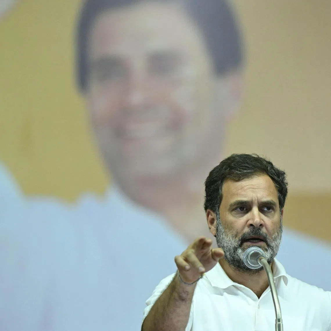 (FILES) Indian National Congress party leader Rahul Gandhi addresses his supporters in Coimbatore on April 12, 2024, ahead of the country's general elections. Prime Minister Narendra Modi's chief rival Rahul Gandhi was nominated on June 8 to lead India's opposition in parliament after an election result that rescued his party from the political wilderness. (Photo by R.Satish BABU / AFP)