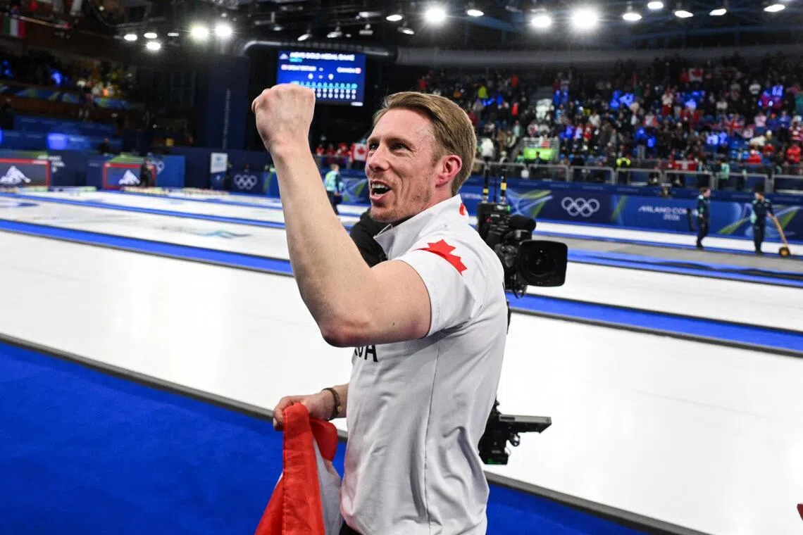 Marc Kennedy of Canada celebrating after beating Britain to the 2026 Milano-Cortina Winter Olympics men's curling goal at the Cortina Curling Olympic Stadium in Cortina d'Ampezzo on Feb 21, 2026.