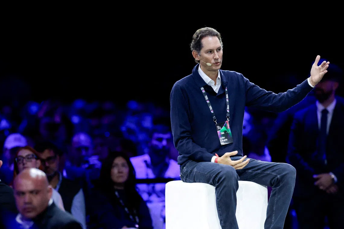 FILE PHOTO: Stellantis Chairman, and Exor CEO John Elkann gestures as he speaks during the Italian Tech Week 2025, in Turin, Italy October 3, 2025. REUTERS/Remo Casilli/File Photo