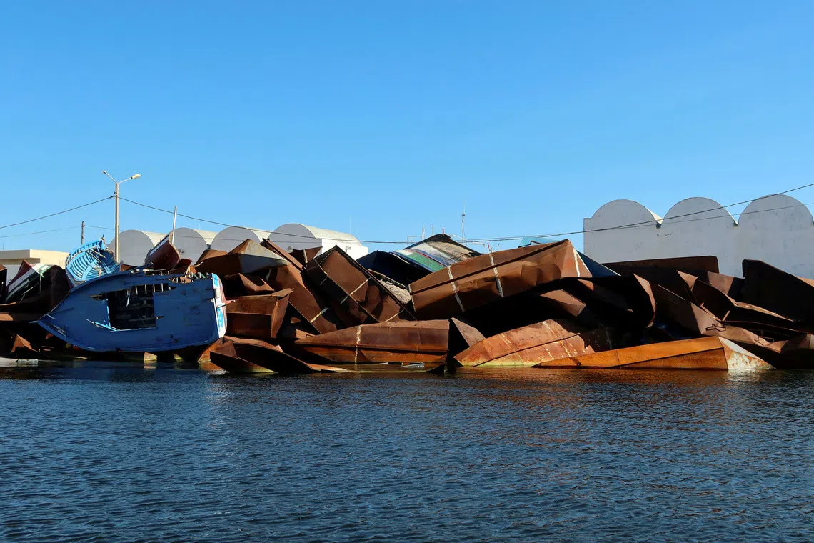 FILE PHOTO: A view shows boats that were used by migrants and seized by Tunisian coastguards, in Sfax, Tunisia April 26, 2023. REUTERS/Jihed Abidellaoui/File Photo