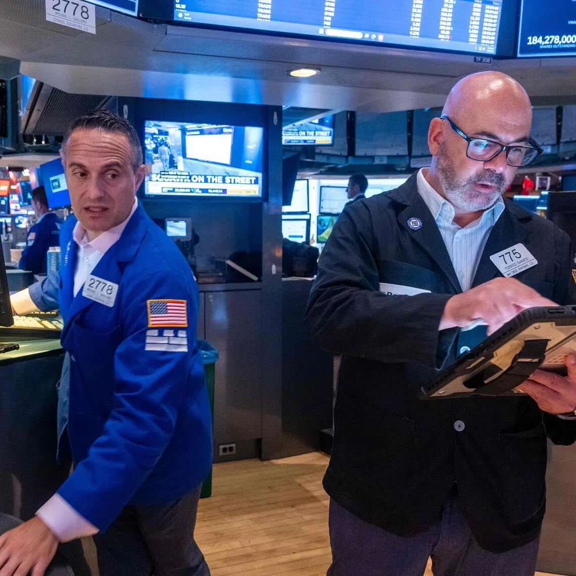 Traders working on the floor of the New York Stock Exchange on July 9, in New York City.
