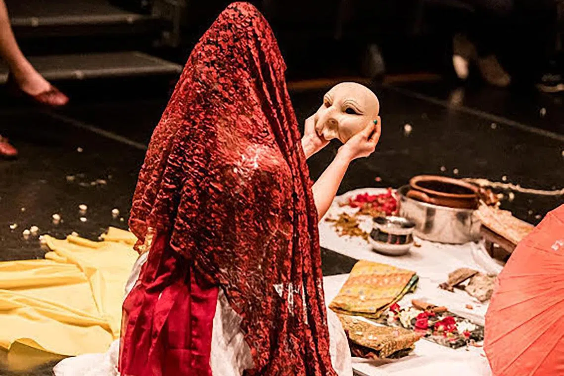 Zarina Muhammad performing a mantra-inspired ritual at Singapore Writers Festival. 