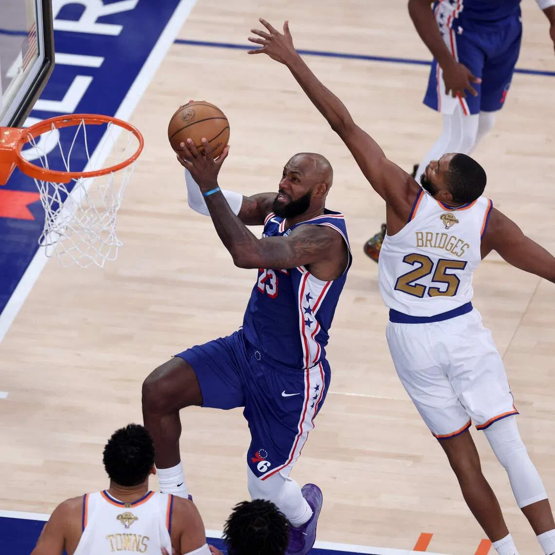 In the first game of his record 24th NBA season, LeBron James registered 14 points, nine rebounds and seven assists.