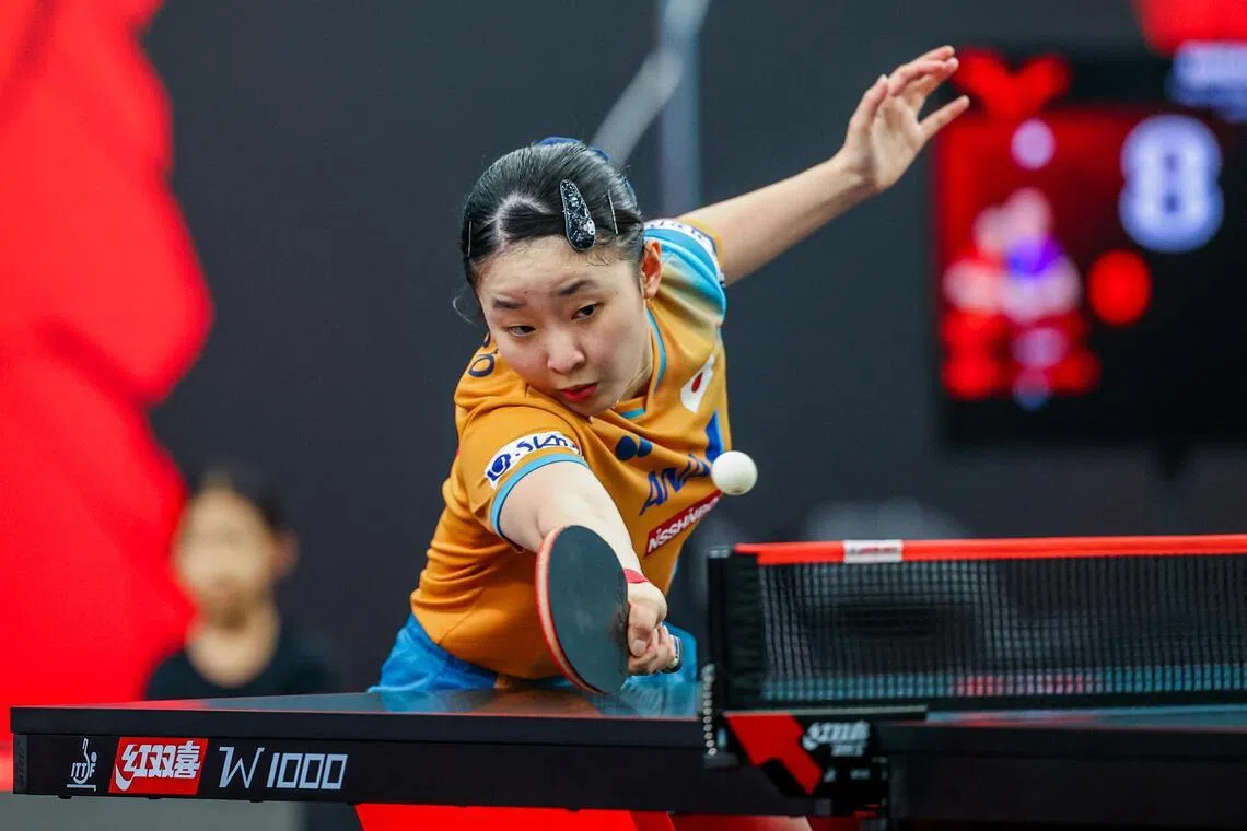 Japan's 17-year-old Miwa Harimoto chalks up wins in the women's singles last 16 and women's doubles  semi-finals with compatriot Hina Hayata at the Singapore Smash.