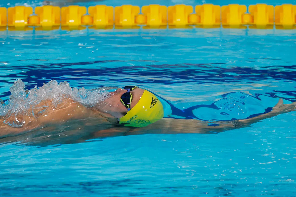 Commonwealth Games 2026 - Swimming - Tollcross International Swimming Centre, Glasgow, Scotland, Britain - July 28, 2026  Australia's Isaac Cooper in action during the men's 100m backstroke semi-final 2 REUTERS/Andrew Couldridge