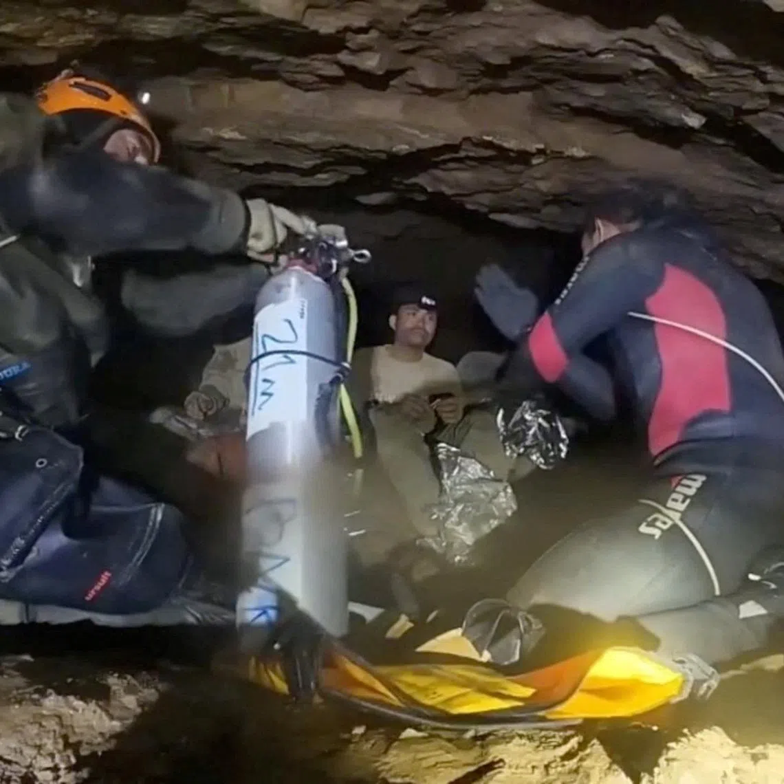 The search for the last two on May 31 was focused on a tight, inundated passage believed to lie beyond the area where the five survivors were found.
