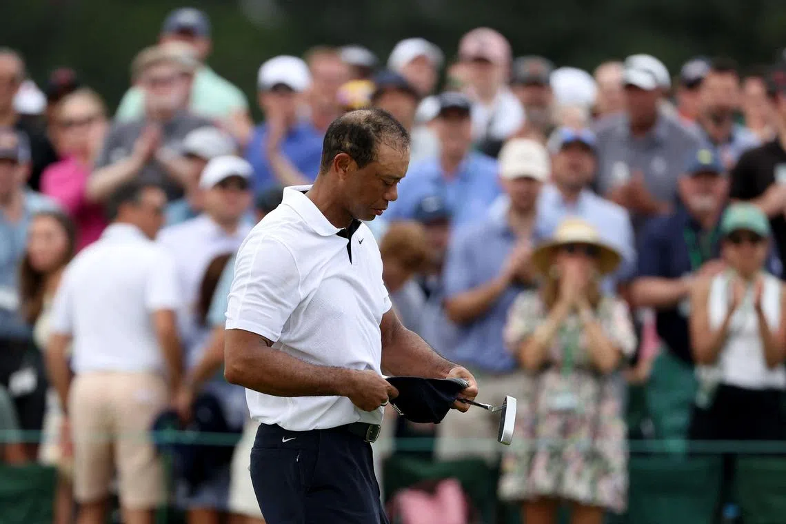Tiger Woods reacts after finishing on the 18th green during the first round of the 2023 Masters Tournament.
