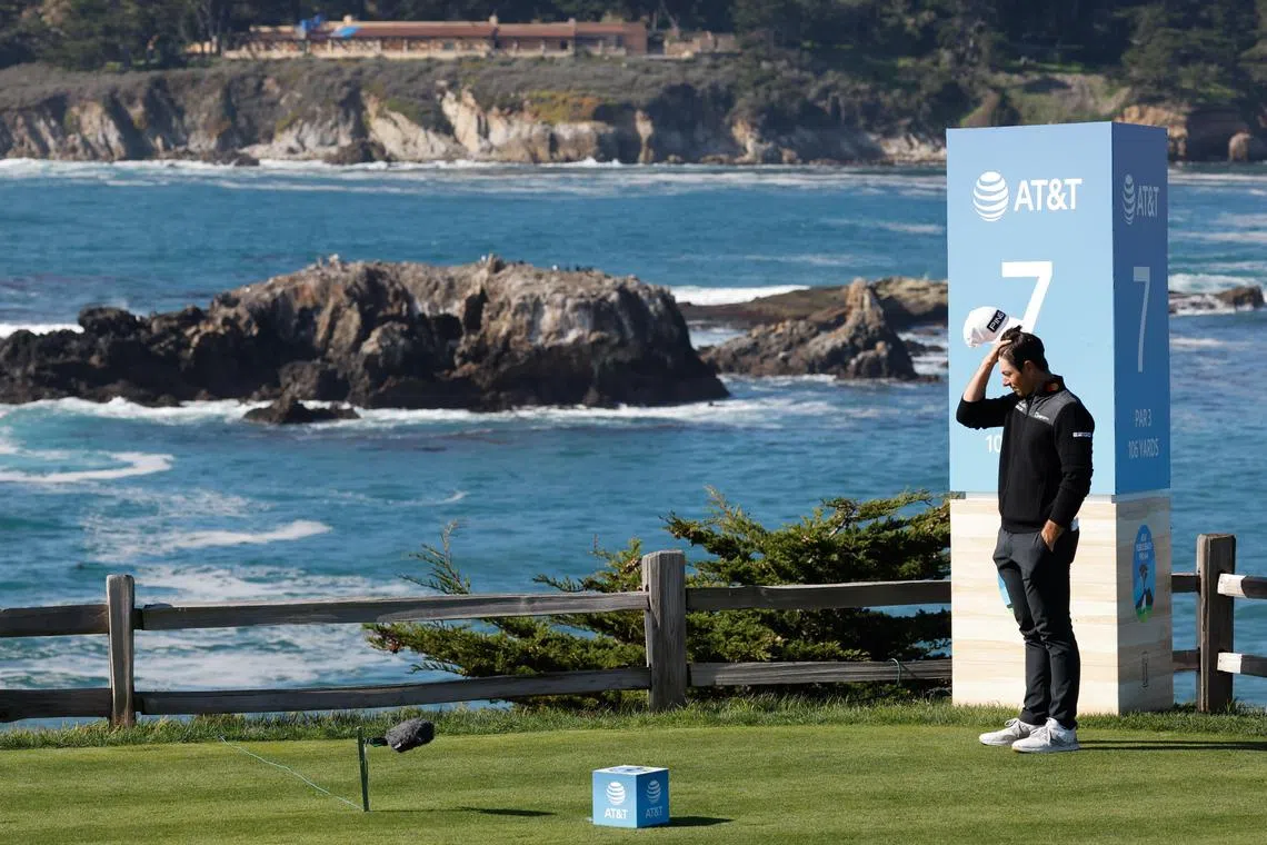 Viktor Hovland of Norway standing alone on the seventh tee after scoring a bogey on the sixth hole during the second round of the Pebble Beach Pro-Am golf tournament at the Pebble Beach Golf Links in California on Feb 2. He finished T58 and has withdrawn from this week's Phoenix Open.