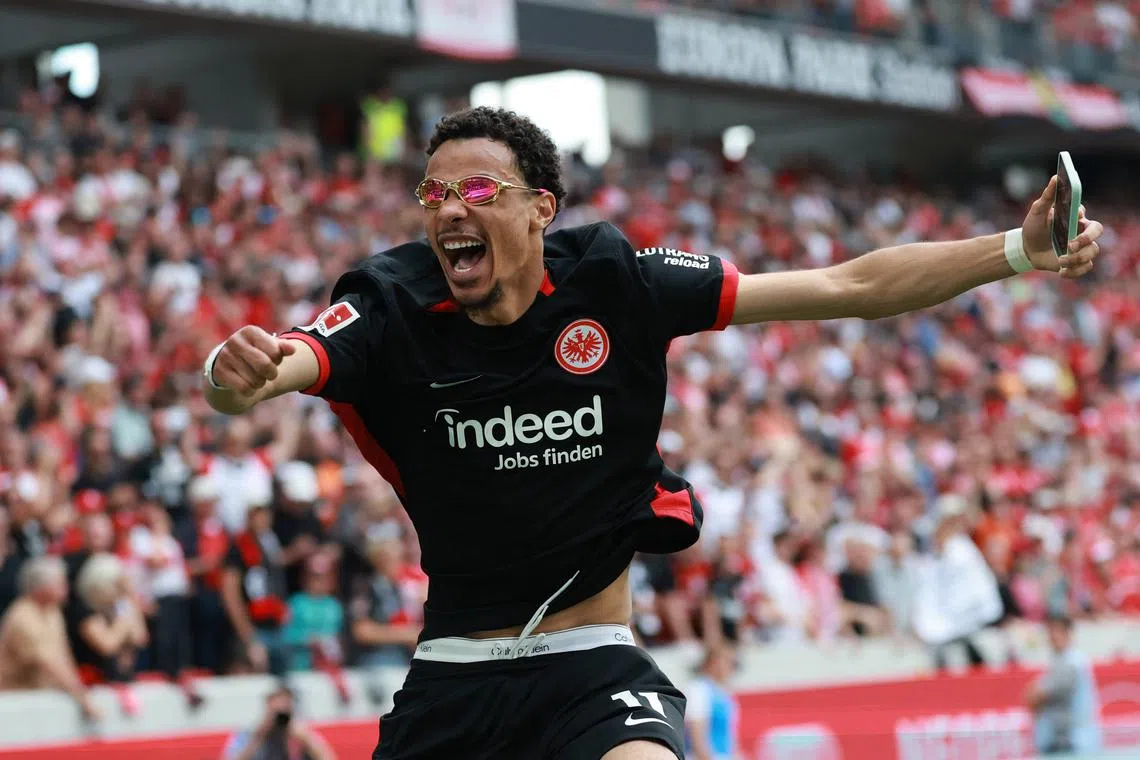 FILE PHOTO: Soccer Football - Bundesliga - SC Freiburg v Eintracht Frankfurt - Europa Park Stadion, Freiburg, Germany - May 17, 2025 Eintracht Frankfurt's Hugo Ekitike celebrates after the match as Eintracht Frankfurt finish the Bundesliga season in third place to qualify for the Champions League REUTERS/Kai Pfaffenbach/File Photo