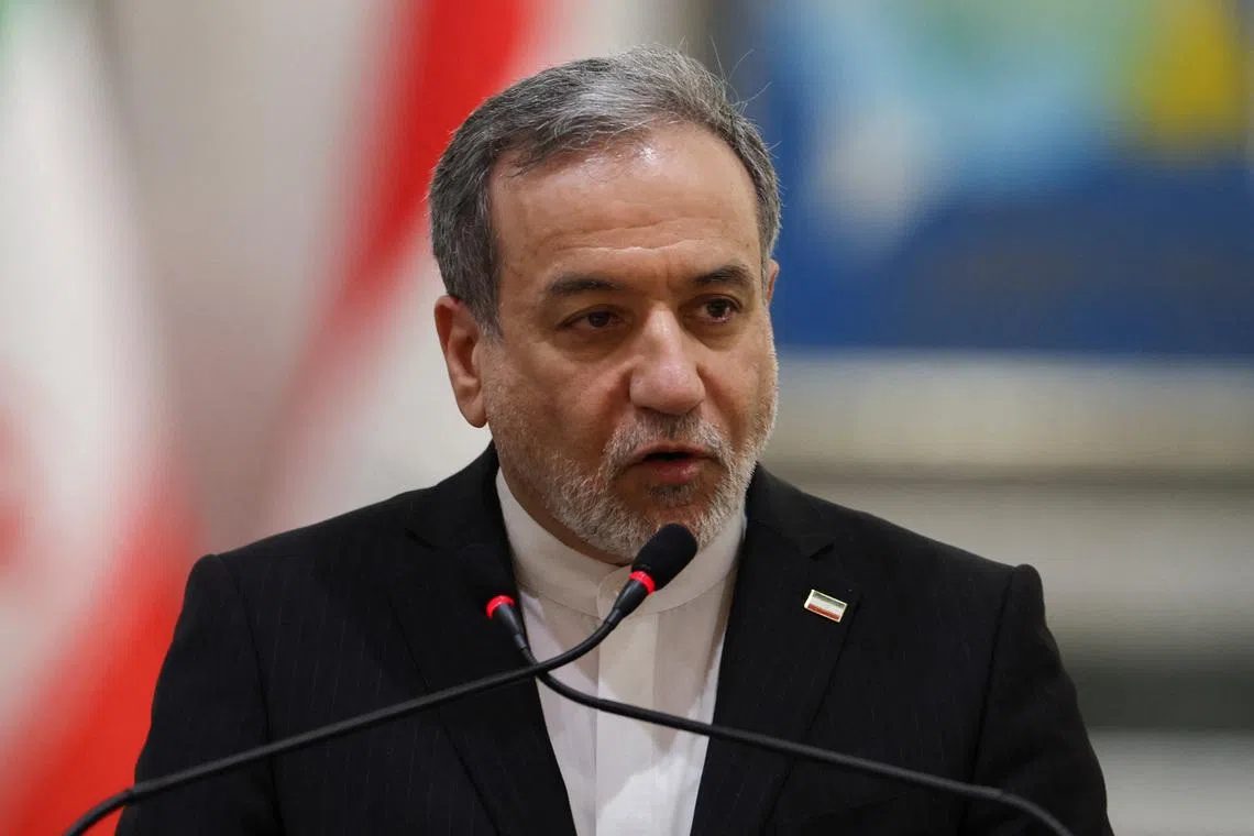 Iranian Foreign Minister Abbas Araqchi attends a press conference alongside Iraqi Foreign Minister Fuad Hussein (not pictured), in Baghdad, Iraq, June 28, 2026. REUTERS/Thaier Al-Sudani