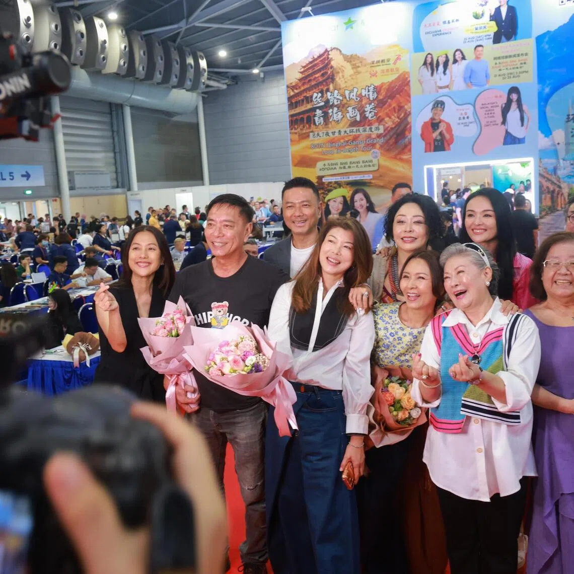 (Front row, from left) Actors Joy Yak, Huang Yiliang, Cherie Lim, Tang Miaoling, Jin Yinji, Kwan Xuemei, (back row, from left) Jason Oh, Cassandra See, Apple Hong and director-producer Michael Woo at the BingBingBiangBiang Kopidiam press event at Singapore Expo on Aug 21.