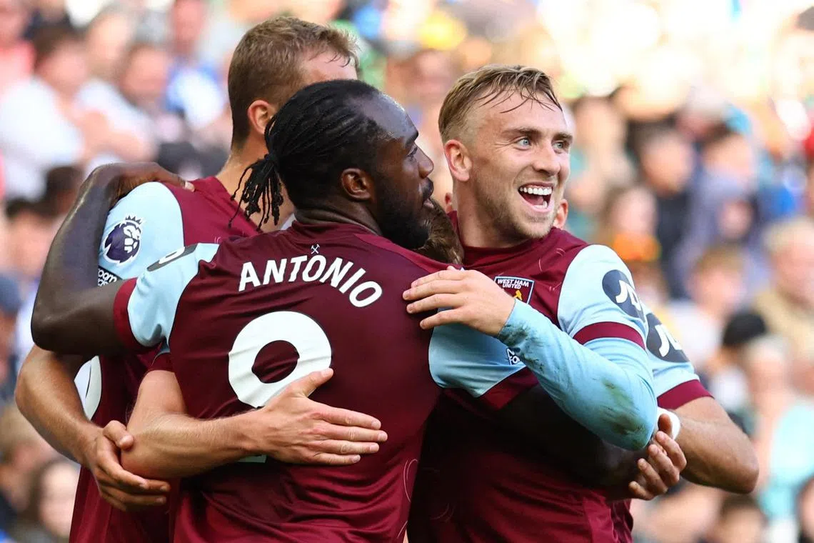 West Ham United's James Ward-Prowse celebrates scoring their first goal with Michail Antonio, Tomas Soucek and Jarrod Bowen.