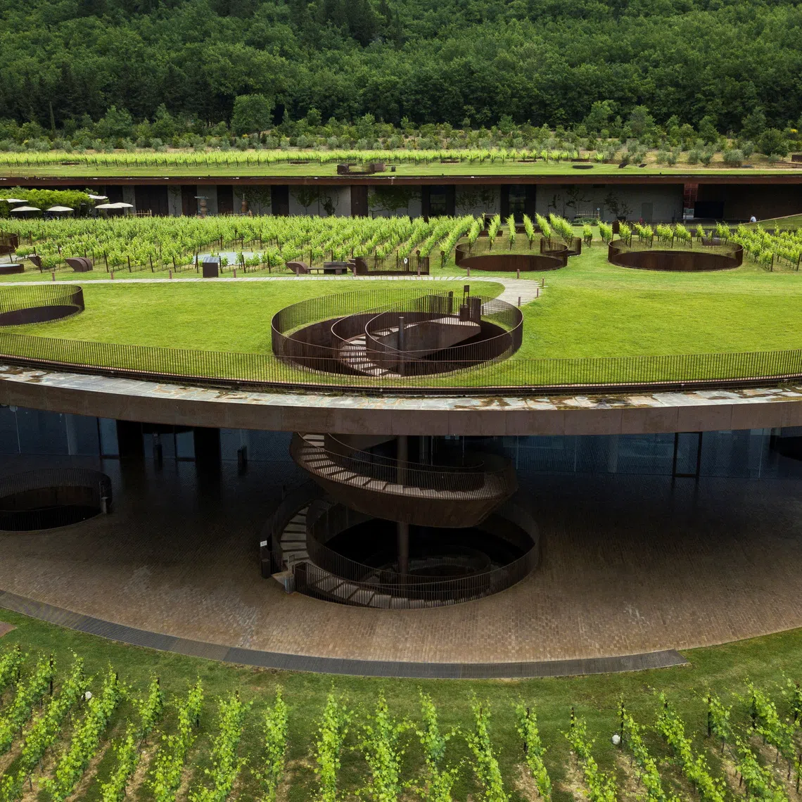 A drone view shows the Marchesi Antinori winery surrounded by vineyards in Bargino, near Florence, Italy, in this undated handout image. Marchesi Antinori Press/Handout via REUTERS