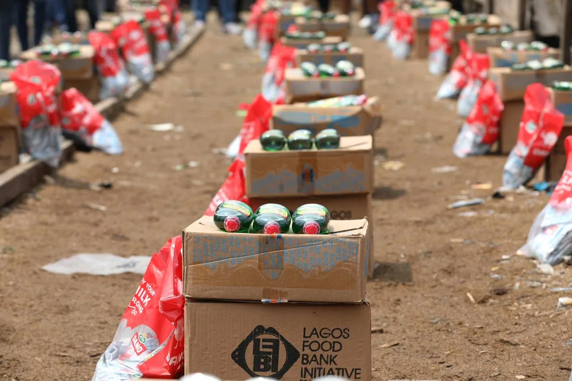 FILE PHOTO: Food supplies are pictured before a food aid distribution by volunteers of the Lagos food bank initiative in a community in Oworoshoki, Lagos, Nigeria July 10, 2021. REUTERS/Temilade Adelaja/File Photo