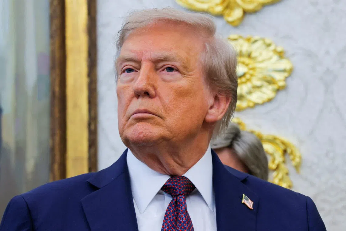 FILE PHOTO: U.S. President Donald Trump attends an event in the Oval Office at the White House in Washington, D.C., U.S., September 2, 2025. REUTERS/Brian Snyder/ File Photo