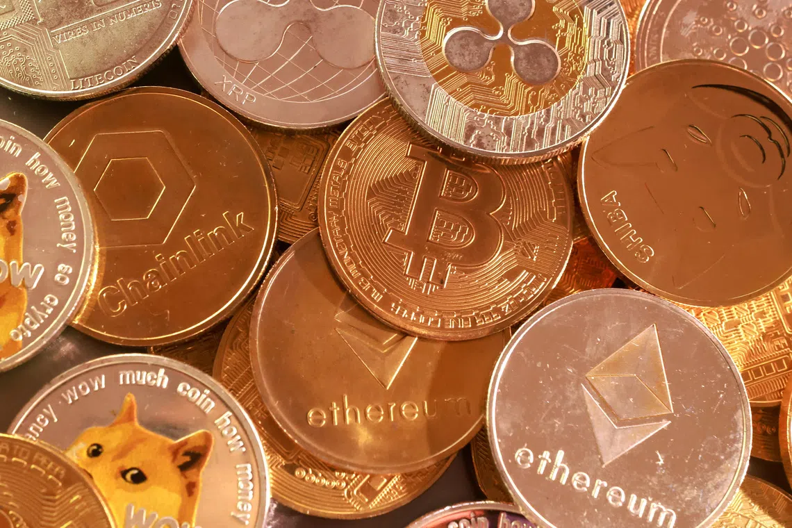 Representation of cryptocurrencies are seen in this illustration taken September 10, 2025. REUTERS/Dado Ruvic/Illustration