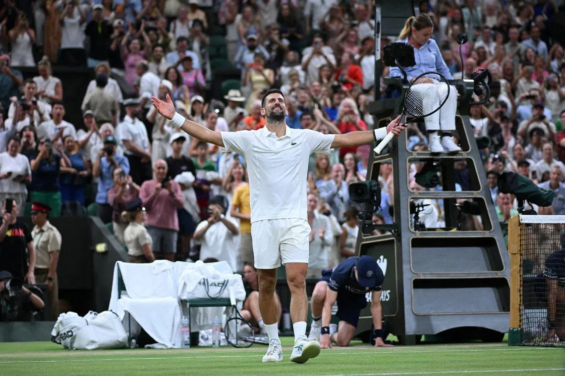 Tennis - Wimbledon - All England Lawn Tennis and Croquet Club, London, Britain - July 7, 2026 Serbia's Novak Djokovic celebrates after winning his quarter final match against Canada's Felix Auger-Aliassime REUTERS/Jaimi Joy