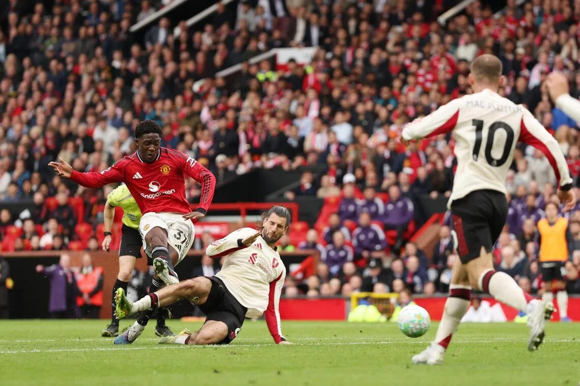 Kobbie Mainoo scoring Manchester United's  third goal during the X-X English Premier League XXX over Liverpool at Old Trafford on May 3, 2026.