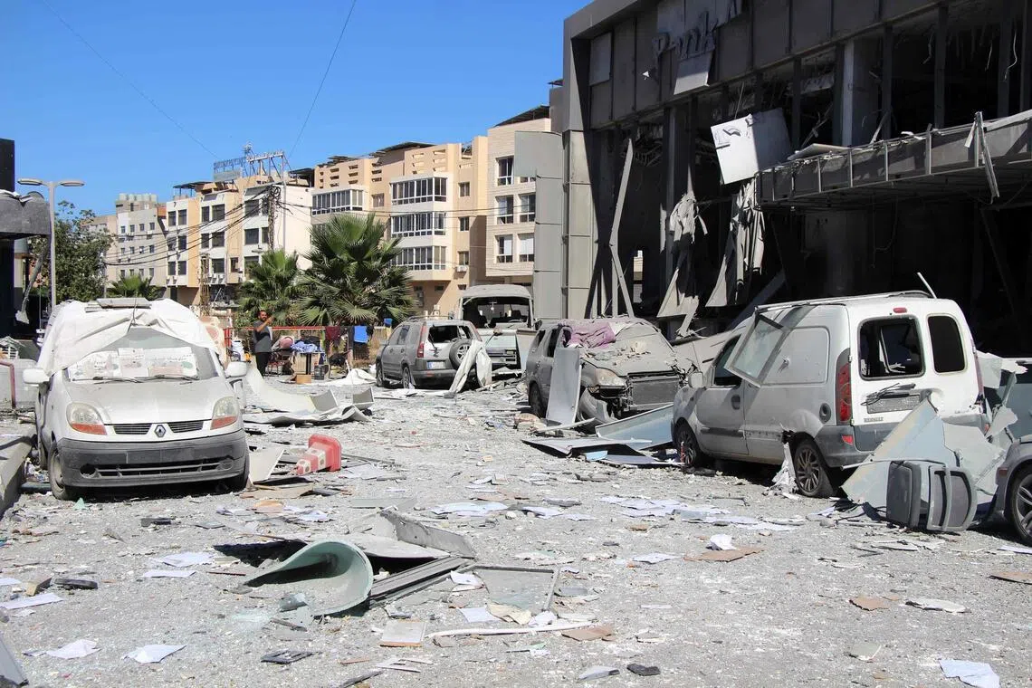 A man inspects the aftermath at the site of an Israeli strike that hit the previous day in the southern Lebanese coastal city of Tyre on June 5.