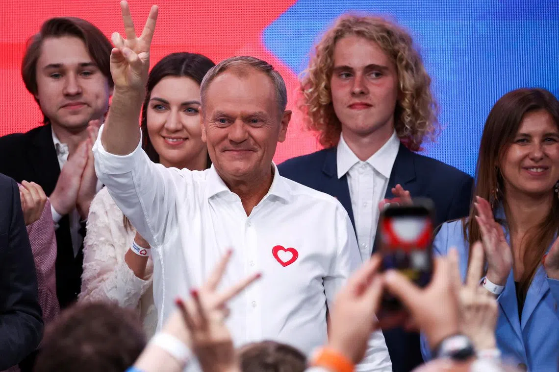 Polish Prime Minister Donald Tusk gestures, following the results of European Parliament election exit polls during the Civic Coalition (KO) election evening, in Warsaw, Poland, June 9, 2024. REUTERS/Kacper Pempel