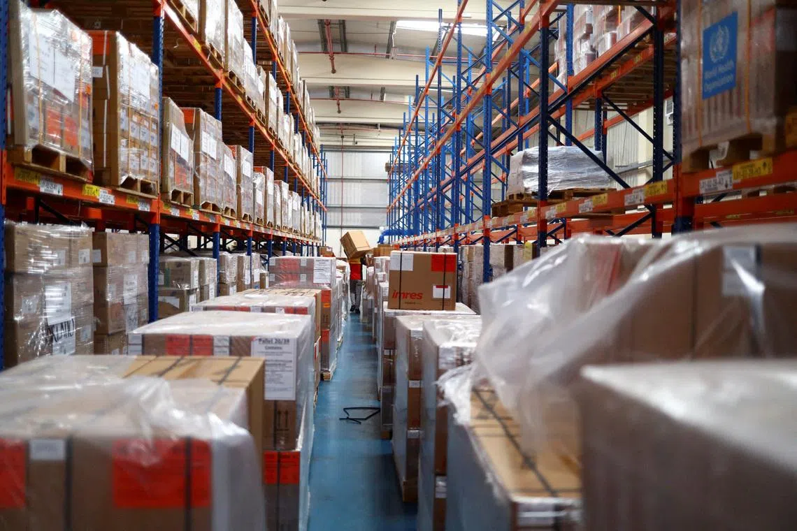 Humanitarian groups stocking goods for rapid regional deployment at warehouses in Dubai’s Humanitarian Hub face challenges moving supplies onto transit routes.