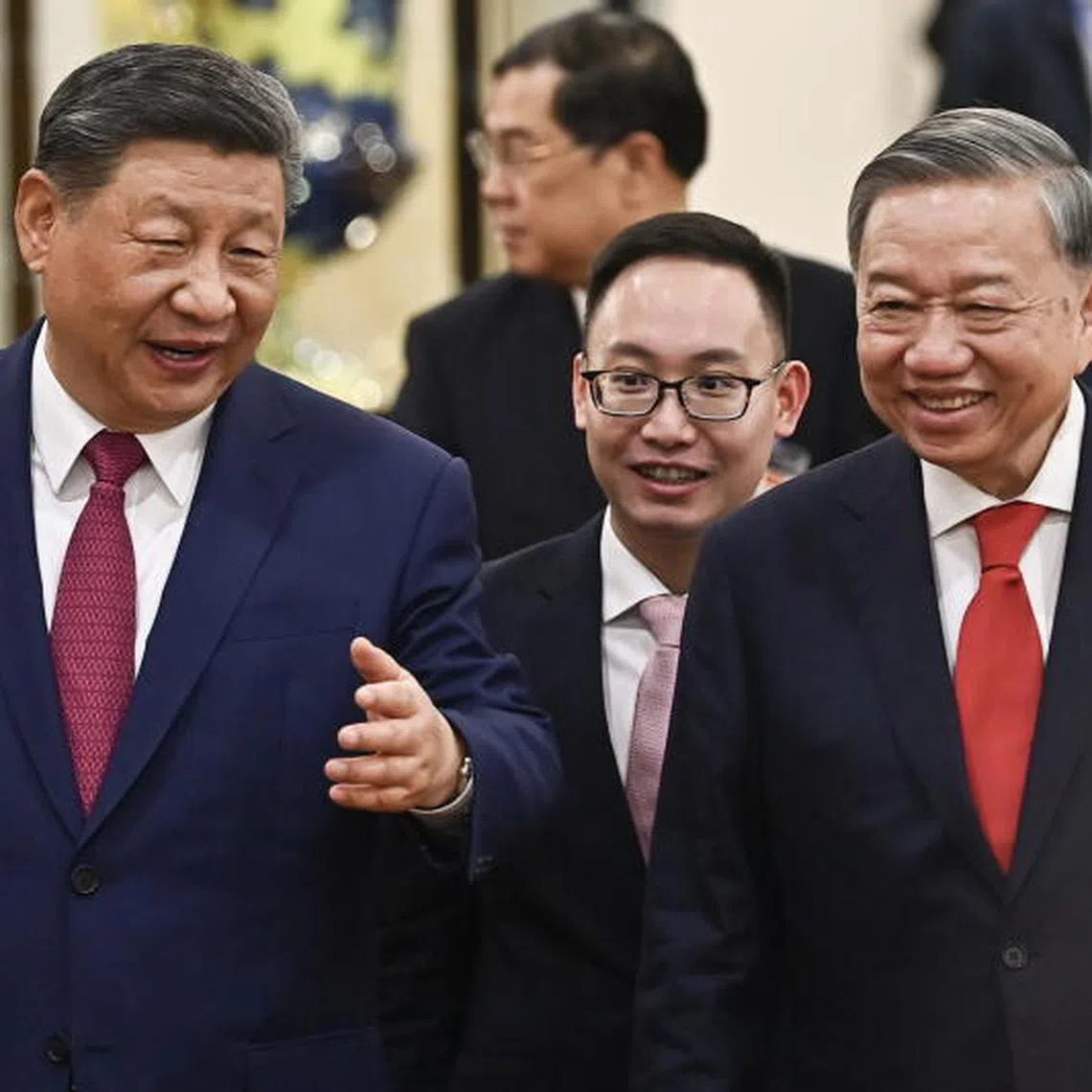 epa12031468 Vietnam's Communist Party General Secretary To Lam (R) and China's President Xi Jinping (L) leave after their meeting at the Office of the Party Central Committee in Hanoi, Vietnam, 14 April 2025. The Chinese president is on a state visit to Vietnam from 14 to 15 April 2025. EPA-EFE/NHAC NGUYEN / POOL