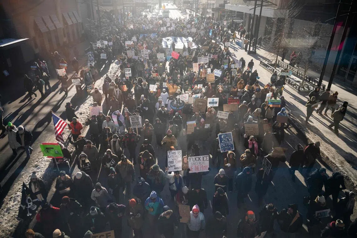 Protestors march during a "Nationwide Shutdown" demonstration against ICE enforcement on in Minneapolis, Minnesota, Jan 30.