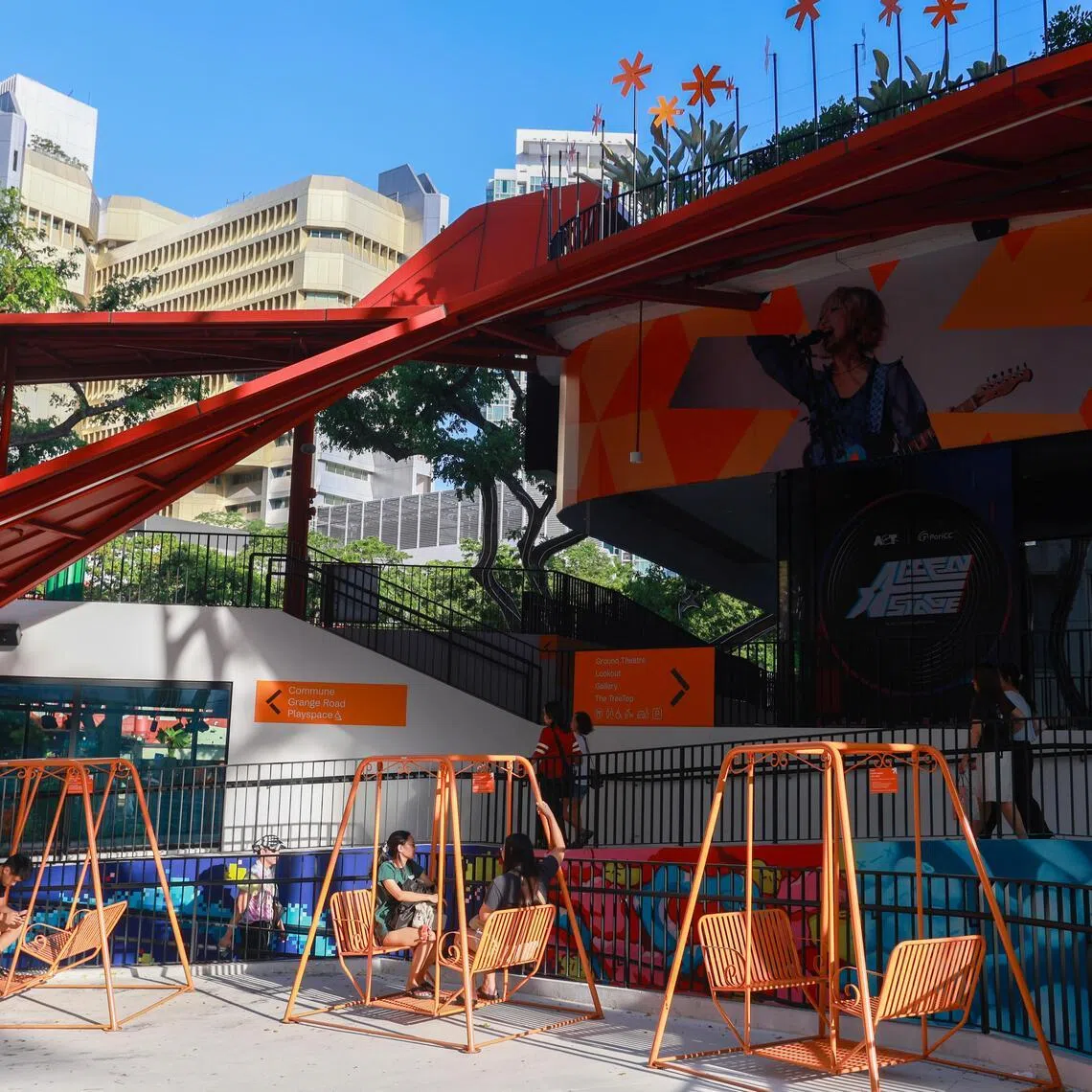 Some youth prefer to hang out on the swings outside *Scape.